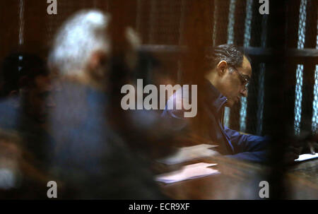 Cairo, Egypt. 17th Dec, 2014. Gamal Mubarak, the son of former president Hosni Mubarak sits in a courtroom cage in Cairo, December 18, 2014. The two sons of Egypt's former president were back in court facing charges of stock market manipulation Credit:  Stringer/APA Images/ZUMA Wire/Alamy Live News Stock Photo