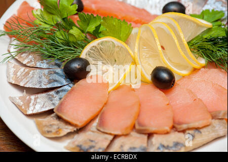 The set marinated mackerel, herring fillet, and salmon Stock Photo