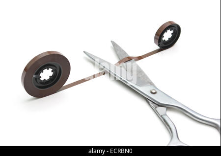 audio tape and scissors isolated on a white background Stock Photo