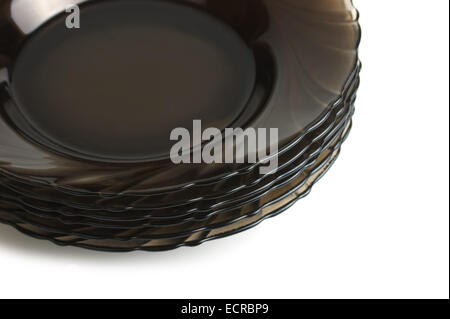 stack of brown plates isolated on a white background Stock Photo - Alamy