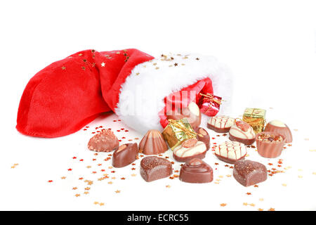 Chocolate and santa boot on a white background Stock Photo