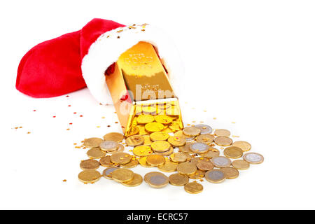 Gold bar and euro money out of santa's boot Stock Photo