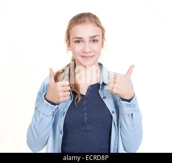 youthful girl with blond hair showing thumbs up Stock Photo
