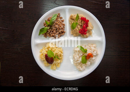 Cereals - buckwheat, rice, millet and wheat groats Stock Photo