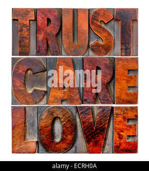 trust, care, love - an isolated word abstract in vintage letterpress wood type Stock Photo