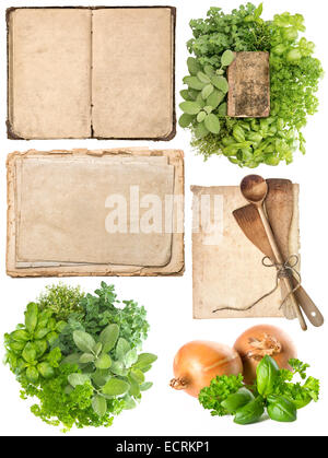 Antique wooden kitchen utensils, old cookbook, pages and herbs isolated on white background. Grandma's recipes book concept Stock Photo