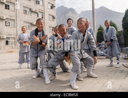 License available at MaximImages.com - Young smiling Shaolin Kung Fu students at a school in DengFeng, Zhengzhou, Henan, China Stock Photo