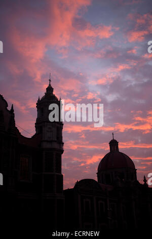 Sunrise during the annual pilgrimage to the Basilica of Our Lady of Guadalupe, Tepeyac Hill, Mexico City, Mexico. Guadalupe is k Stock Photo