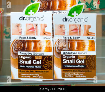 Snail Gel cosmetic cream for improving skin texture and reducing ageing shop window display Stock Photo