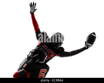 one american football player touchdown celebration in silhouette shadow on white background Stock Photo