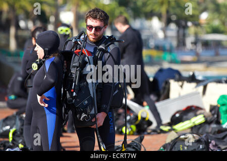 Group Of Divers Preparing To Go Diving In Avalon, Catalina Island, California. Stock Photo