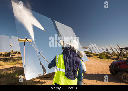 Cleaning heliostats at California's Ivanpah solar thermal power station, the largest solar thermal plant in the world. Stock Photo