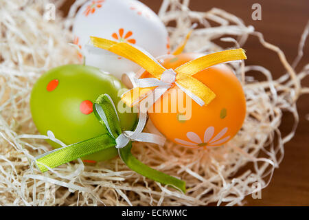 Easter eggs in the straw Stock Photo