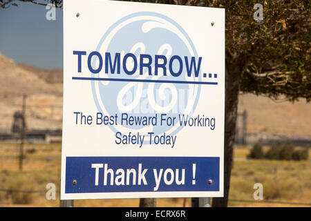 A sign at a wind farm plant at the Tehachapi Pass wind farm, the first large scale wind farm area developed in the US, California, USA. Stock Photo