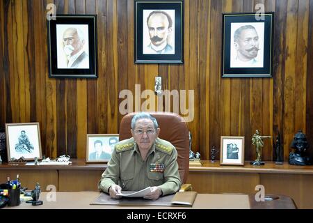 Havana. 18th Dec, 2014. Image taken on Dec. 16, 2014 provided by Estudios Revolucion on Dec. 18, 2014 shows Cuban President Raul Castro at his office in Havana, Cuba. The United States and Cuba announced Wednesday that they have agreed to restore diplomatic relations, in a move to end more than half a century of estrangement between the two countries. Credit:  Estudio Revolucion/Xinhua/Alamy Live News Stock Photo