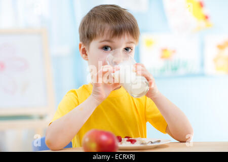 child drinking healthy beverage at home Stock Photo