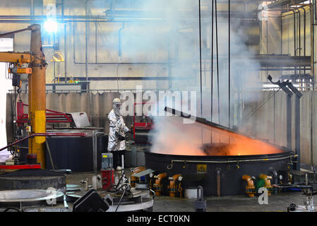 Workpieces are being cooled down in a hardening shop Stock Photo