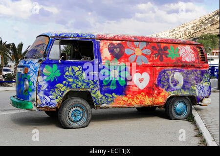 Old painted VW camper van, hippie van, Matala, Crete, Greece Stock Photo