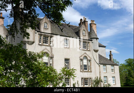 The beautiful scottish tower house of Leith Hall built in 1650 with its towers and turrets bathed in late summer sunshine Stock Photo