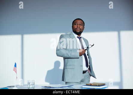 Pensive businessman of African ethnicity thinking of something Stock Photo