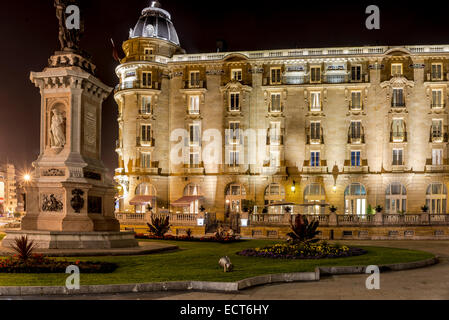 Maria Cristina Hotel. Old town of San Sebastián by night. Donostia, Basque Country, Spain Stock Photo