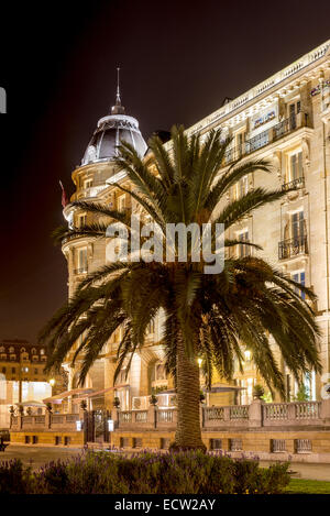 Maria Cristina Hotel. Old town of San Sebastián by night. Donostia, Basque Country, Spain Stock Photo