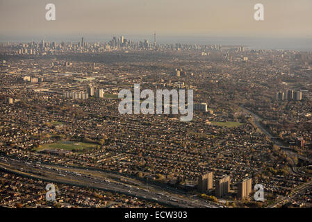 Aerial view of Highway 401 and 400 Black Creek Drive with downtown Toronto city skyline on Lake Ontario Canada Stock Photo