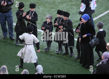 Members of the Chechen childrens' dance group Bashlam getting ready for a performance in the FC Terek football stadium in the Chechen capital Grozny, prior to a football match between Terek and FC Zenit from St Petersburg. Stock Photo