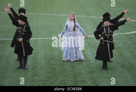 Members of the Chechen childrens' dance group Bashlam during a performance in the FC Terek football stadium in the Chechen capital Grozny, prior to a football match between Terek and FC Zenit from St Petersburg. Stock Photo