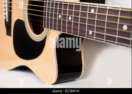 Acoustic electric guitar close up on white background Stock Photo