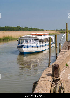 A river tour / pleasure craft on the River Alde at Snape Maltings, Snape, Suffolk, eastern England. Stock Photo