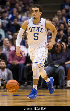 December 18, 2014: Duke Blue Devils guard Tyus Jones (5) in action during the NCAA basketball game between Connecticut Huskies and the Duke Blue Devils at the IZod Center in East Rutherford, New Jersey. The Duke Blue Devils won 66-56. Stock Photo