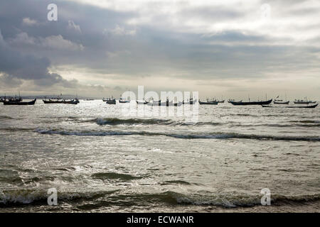 Winneba, fishing village on the Gulf of Guinea, near Accra, Ghana, Africa.Fishing fleet at sea in the aTLANTIC Stock Photo