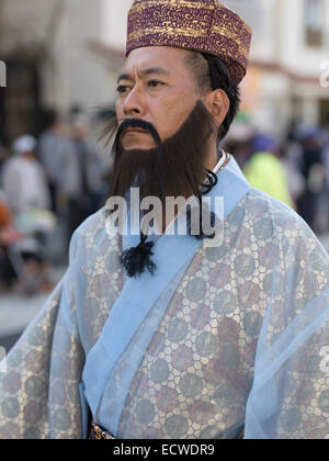 Okinawan man in traditional costume at Ryukyu Mura historical village ...