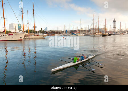 Barcelona, Spain - August 26, 2014: Twin sport racing rowing boat goes in Vista port harbor Stock Photo