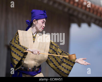 Hanashiro Fujiko performs Kanayo Amaka a traditional Ryukyu Dance at Shuri Castle. Stock Photo