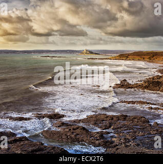 Scenic view of seaside landscape with waves crashing on rocky beach Stock Photo