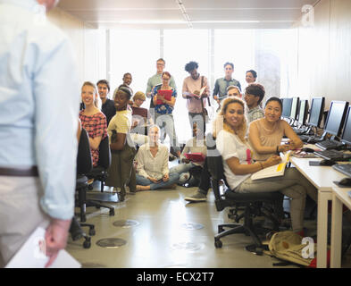 University students listening to presentation in IT classroom Stock Photo