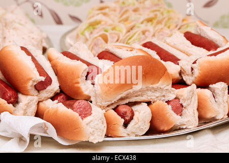 Plate of freshly made hot dogs on a buffet table Stock Photo