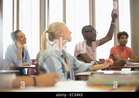 University students listening attentively at seminar Stock Photo