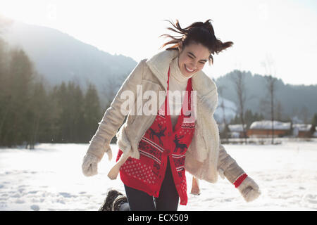 Happy woman in snow Stock Photo