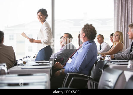 Portrait of businesswoman giving presentation in office Stock Photo