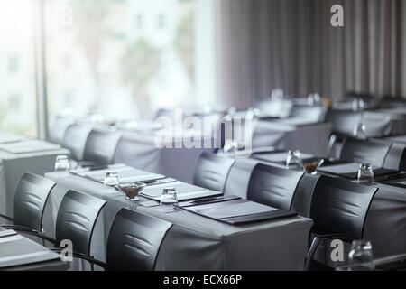 View of empty conference room with tables Stock Photo