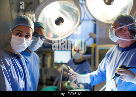 Team of surgeons during operation in operating theater Stock Photo