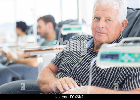Portrait of patient undergoing medical treatment in outpatient clinic Stock Photo