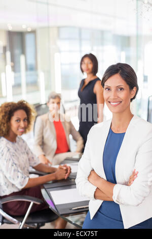 Portrait of businesswoman in conference room Stock Photo