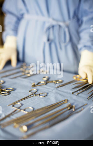 Surgical equipment on table in operating theater Stock Photo