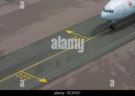 Aerial view (from control tower) of Canadian airliner at London Heathrow airport. Stock Photo