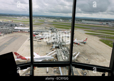 Aerial view (from control tower) showing expanse of airport land with airliners at London Heathrow. Stock Photo