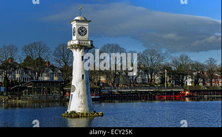 Panoramic view of Roath Park boat houses and restaurants, with the Scott memorial lighthouse in the foreground. Stock Photo